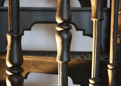 Reeded balusters on a cast iron staircase