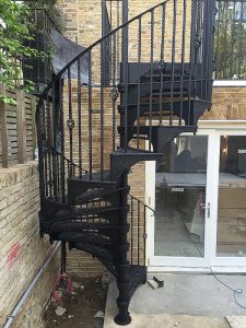 External Cast iron staircase using basket and double twist balusters