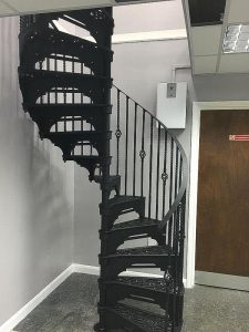 Basket and Double twist spindles on 1830mm cast spiral stair