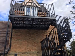 Cast Iron Staircase on extended Balcony